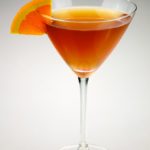 Sidecar in a Martini Glass garnished with lemon wedge